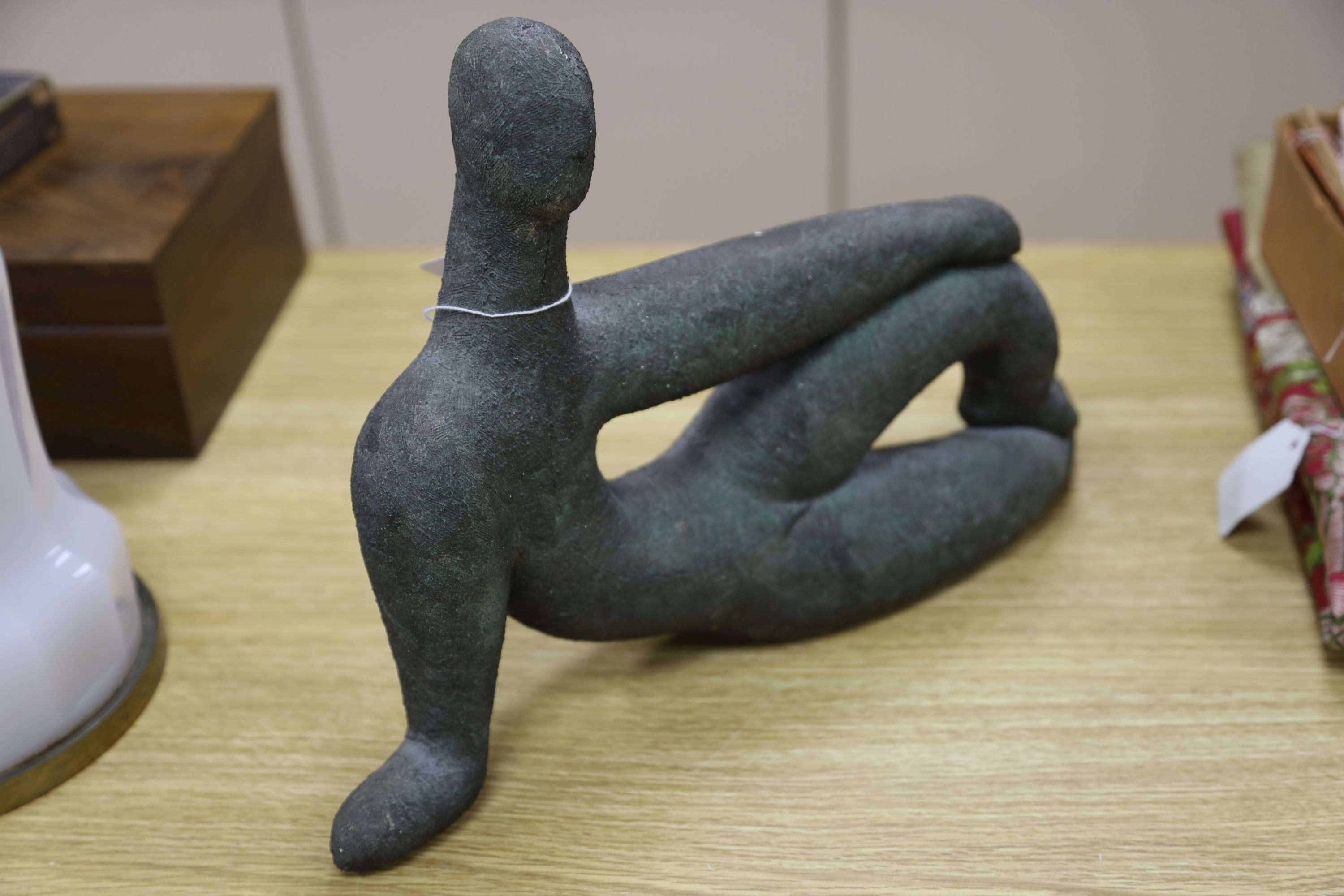 A bronzed pottery abstract figure, marked ‘WP 92’ 40cm